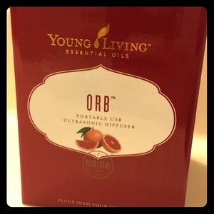 LIKE NEW Young Living Orb Car Diffuser & 5 wicks